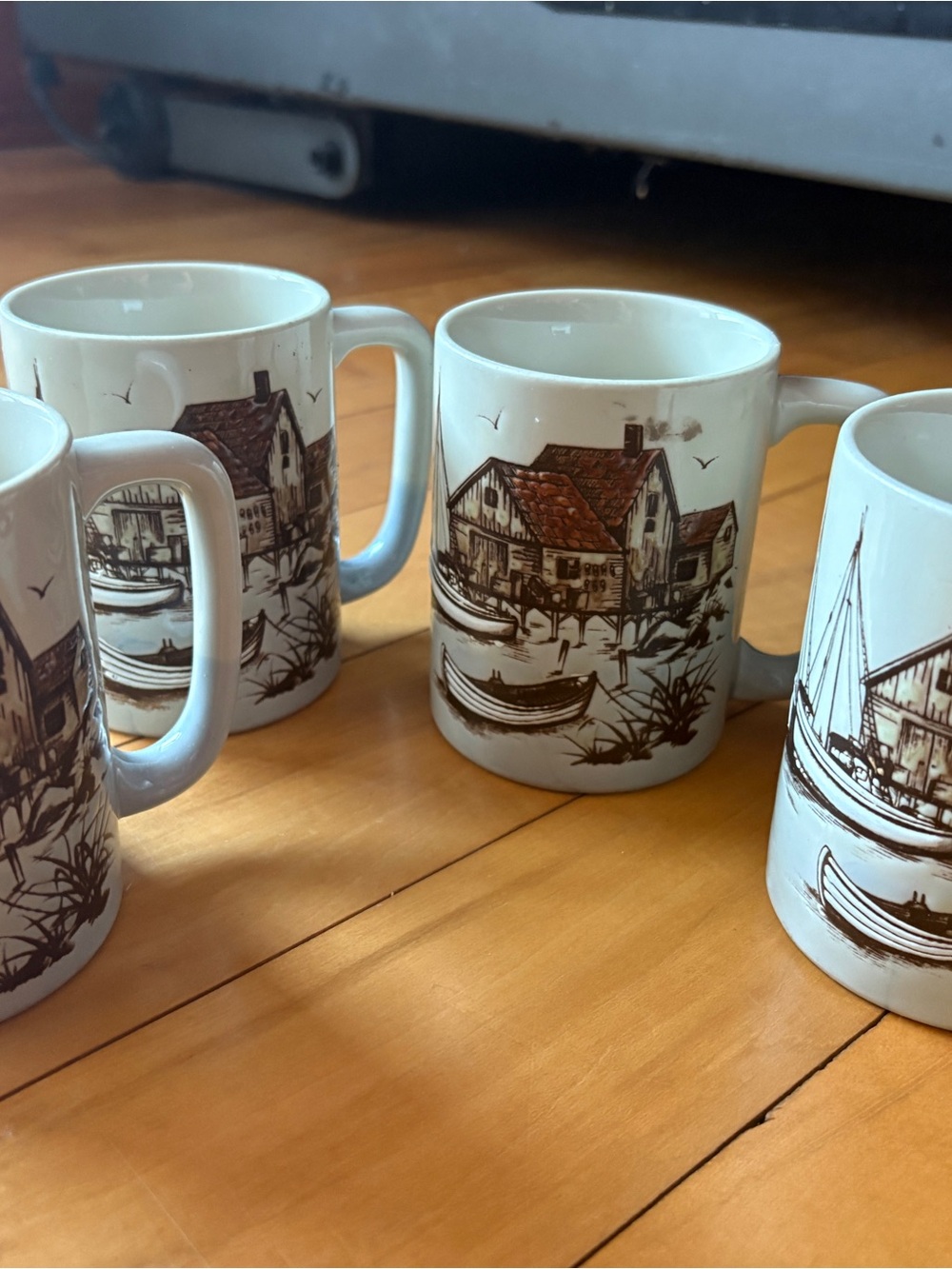 Otagiri Cream Ceramic Mugs with Brown Coastal Village Illustration